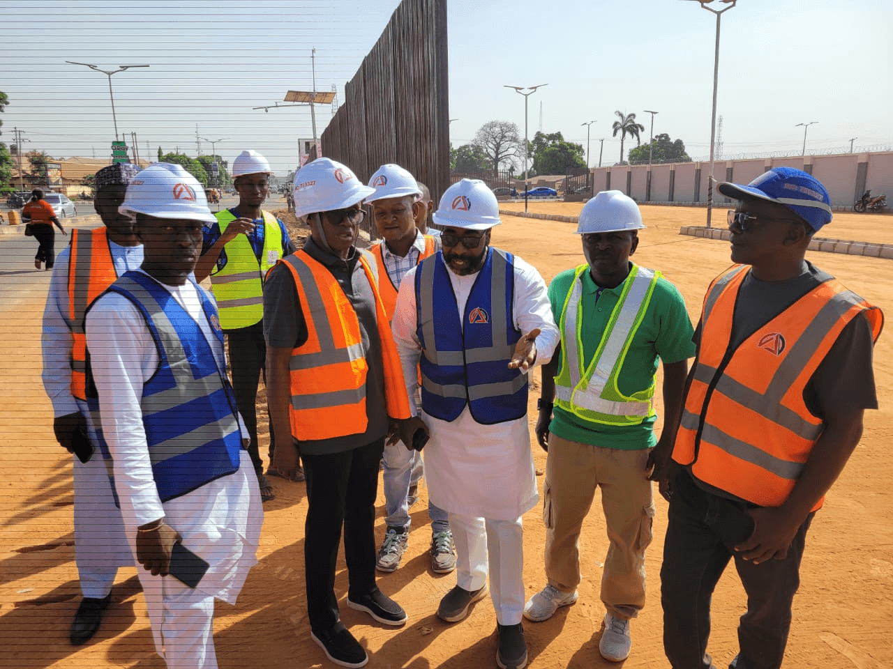 Team inspecting site in hard hats