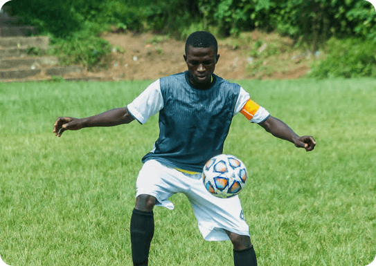 Sadiq Muhammed with ball on pitch