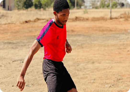 Steven running on pitch